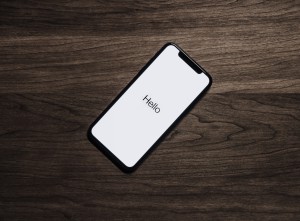 smartphone with word hello on white screen