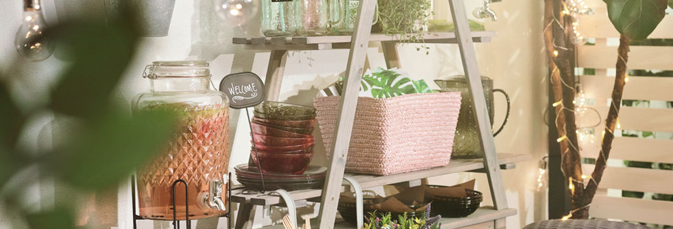 etagere with flower pots and glasses