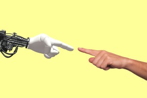 robot hand and human hand touching