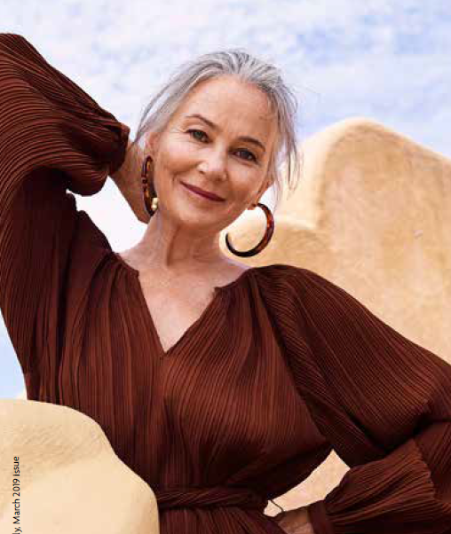 Radiant woman with grey hair in brown dress - Defiant