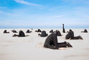 people sticking their heads in the ground