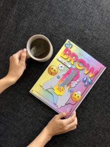 The Lifted Brow cover on table