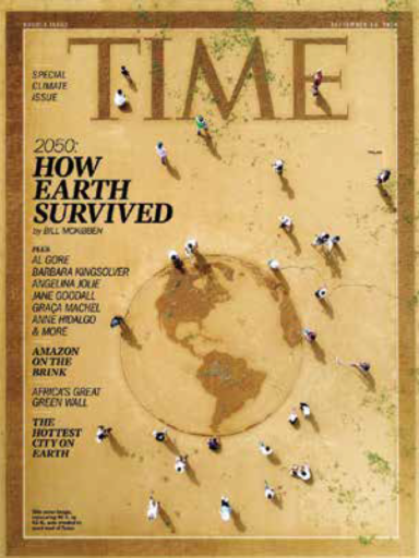 Cover of Time magazine in sand