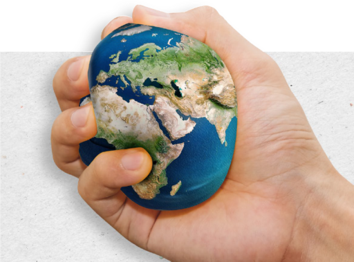 hand squeezing the earth